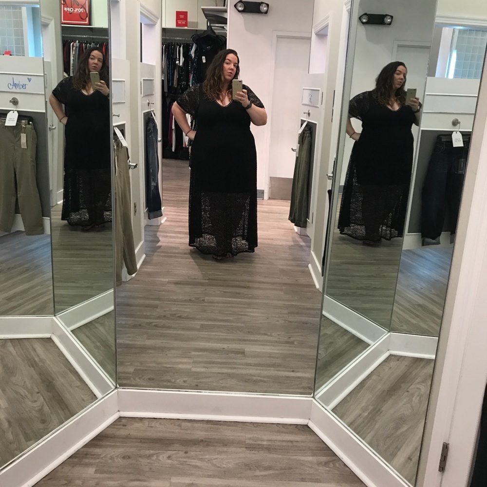 Black lace dress with black body con dress under